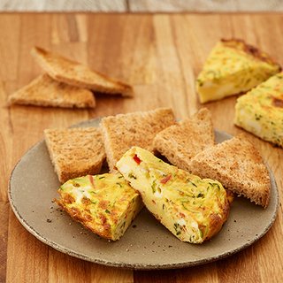 2 slices of veggie frittata, served with small slices of wholemeal toast