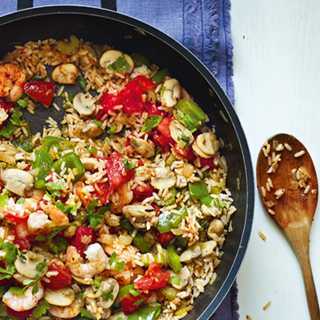 A pan of rice, prawn and vegetables