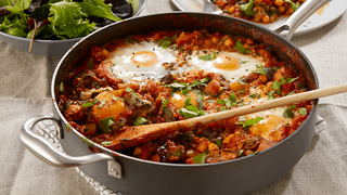 Spicy tomato sauce with peppers, chickpeas and baked eggs