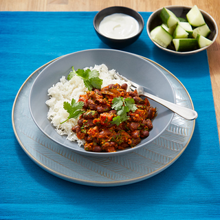 A bowl of kidney bean curry served with rice