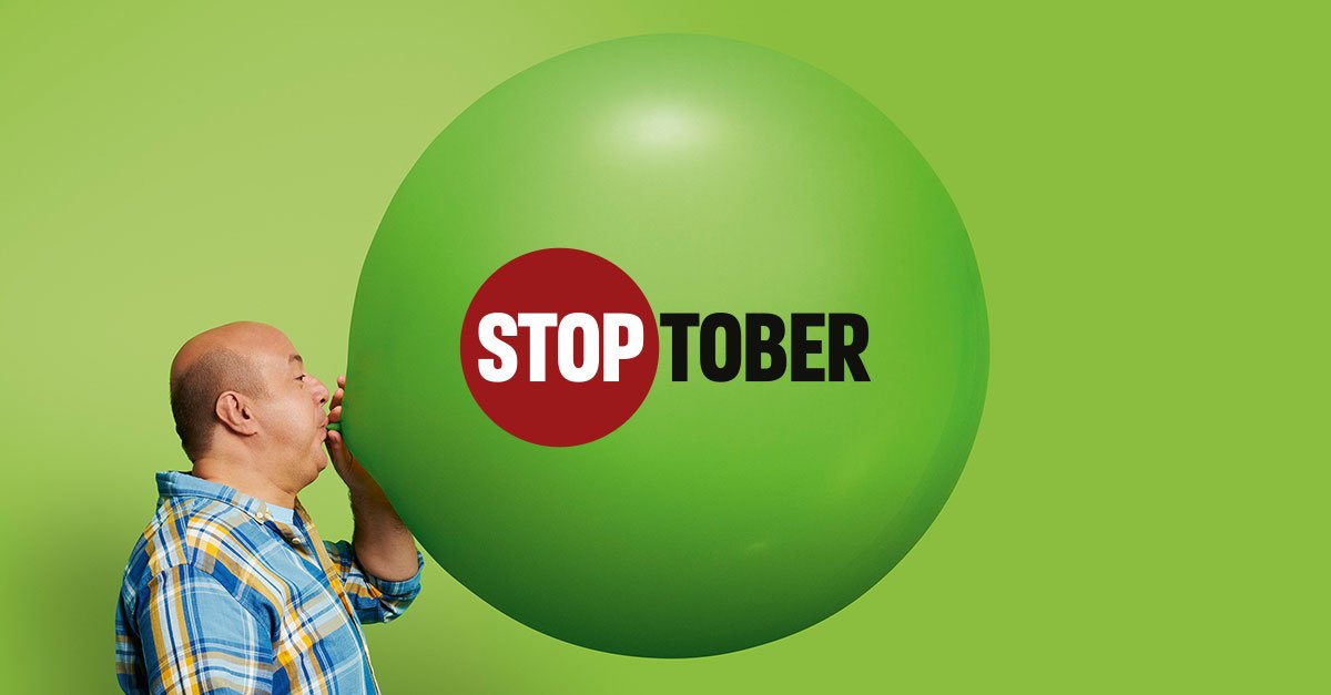 A person kicking a football into a goal. Stoptober logo is in the corner.